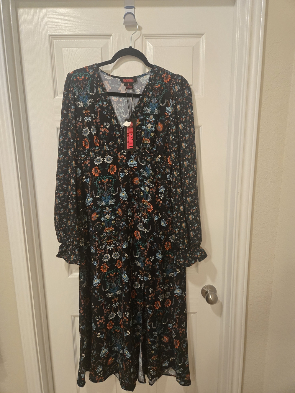 Black Floral Maxi Dress with V-Neck and Ruffle Cuffs